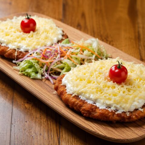 Borzask turkey breast with garlic sour cream and grated cheese